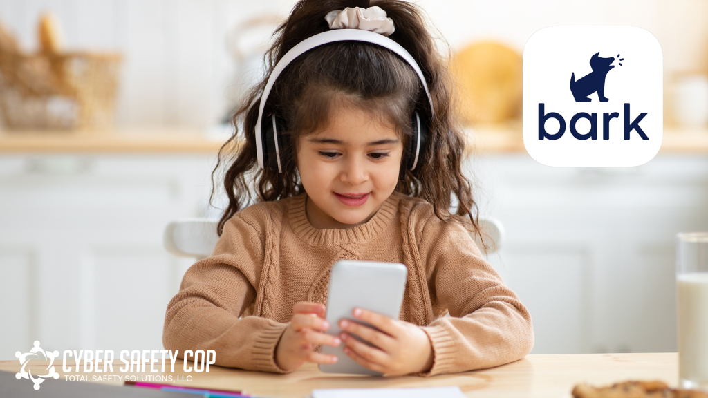 A young girl wearing headphones smiles while looking at a smartphone. The Bark app logo is in the top right corner, and the Cyber Safety Cop logo is in the bottom left. She sits at a table in a bright kitchen, exploring a Parental Control App.