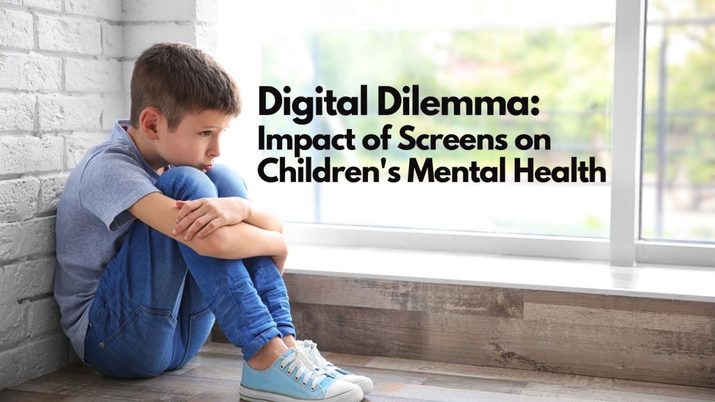 A young boy sits on the floor by a window, hugging his knees and looking worried. Text beside him reads, “Digital Dilemma: The impact of screens on children’s mental health.”.