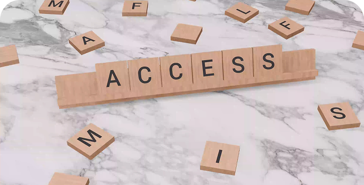 Wooden Scrabble tiles spell out "ACCESS" on a marble surface, evoking thoughts of Membership, with scattered letter tiles like M, F, S, and I reminiscent of arranging words on a Homepage.